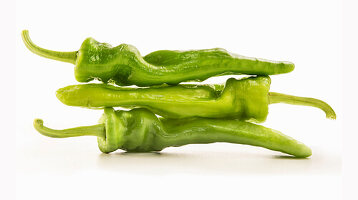 Superimposed green friggitelli peppers