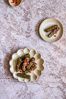 Lebanese Stuffed Grape Leaves (Warak Enab) are made with a spiced ground beef and rice mixture