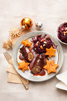 Venison roulades with red cabbage and sweet potato gratin stars