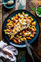 Chicken breast fillet in a pepperonata with potato pumpkin vegetables