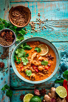 Indian soup with lentils and chicken meat