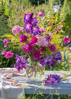 Bouquet of gladioli, ornamental baskets, phlox and roses