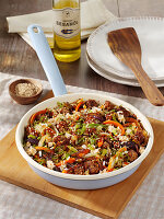 Beef, peppers and onions with sesame seeds in a skillet
