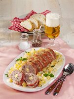 Bacon wrapped, cheese stuffed roast with turnips
