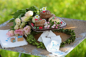 Mini bundt cakes, bouquet of tulips, box wreath and stamped fabric remnants with Easter greetings