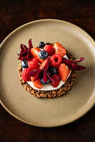 Granola tartlet with fresh berries