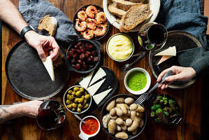 Tapas buffet with papas arrugadas, mojo, piementos de padron, prawns and chorizo