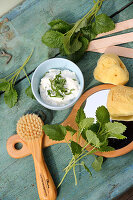 Face mask of lemon balm, curd and honey for sallow and reddened skin