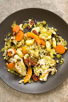 Roasted vegetables with pesto and pecans