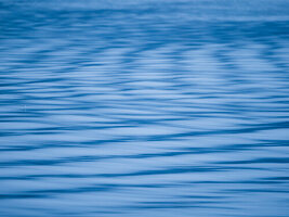 Ripples on water abstract.