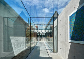 Glass connection between two buildings