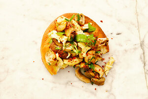 Mini focaccia with mushrooms, parsley, and chili