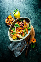 Couscous pear salad with walnuts and gratinated goat brie