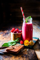 Raspberry smoothie with oat flakes and ginger