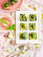 Wilted greens and goat’s cheese squares