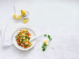 Vegan couscous salad with peppers and sweetcorn