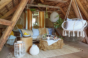 Cosy attic with hanging chair and rustic interior