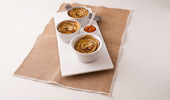 Apple puff pastry roses in moulds