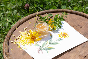 Joint balm made from arnica oil, St John's wort oil and beeswax