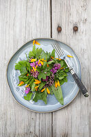 Wild herb salad with flowers
