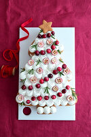 Orange and honey Christmas tree cake with sour cream frosting