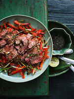 Thai-style beef salad with lime leaves and chillies