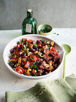 White bean and bread salad with tomatoes, chorizo and oven peppers
