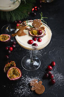 Milky-creamy winter cocktail with passion fruit and cranberries