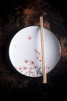 Oriental plate with chopsticks