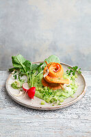 Arctic char rolls on cucumber and herb cream