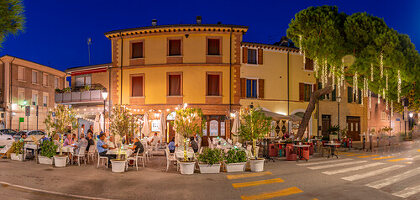View of cafe in Borgo San Giuliano district in Rimini at dusk, Rimini, Emilia-Romagna, Italy, Europe