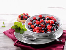 Fresh raspberries, blueberries, redcurrants, blackberries and mint