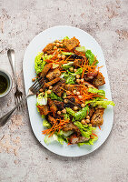 Salad with chicken, croutons and chickpeas