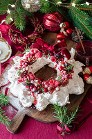 Meringue wreath with berries for Christmas