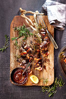 Chicken liver skewers with apple and bacon