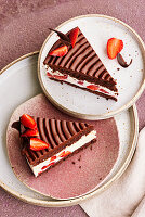 Chocolate and cheese cream cake with strawberries