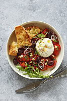 Burrata with roasted tomatoes, olives and pine nuts