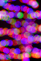 Pattern of out of focus Christmas lights.