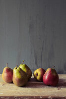 Still life with pears on a rustic wooden table