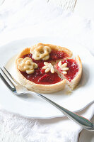 Strawberry tart with pastry flowers
