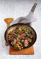 Lamb pan with aubergines and chickpeas