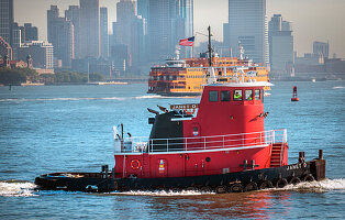 Janet D tugboat and Staten Island ferry, New York Bay, New York City, New York, USA