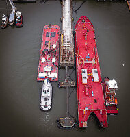 High angle view of barges unloading bulk liquids, IMTT, Bayonne, New Jersey, USA