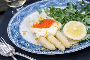 Asparagus with butter sauce and trout caviar