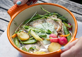 Chicken stew with lemon stock, potatoes and vegetables