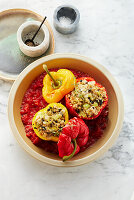 Stuffed peppers with oat groats on tomato sauce