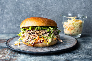 Pulled pork burger with coleslaw garnish