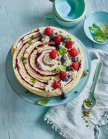 Wrap cake with fresh berries and mint