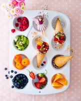 Children's fruit tray with fruit ice-cream cones