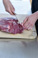 Carving a leg of venison